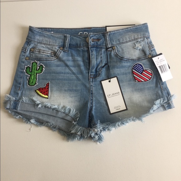 CP Pants - Appliqués Distressed Denim Shorts